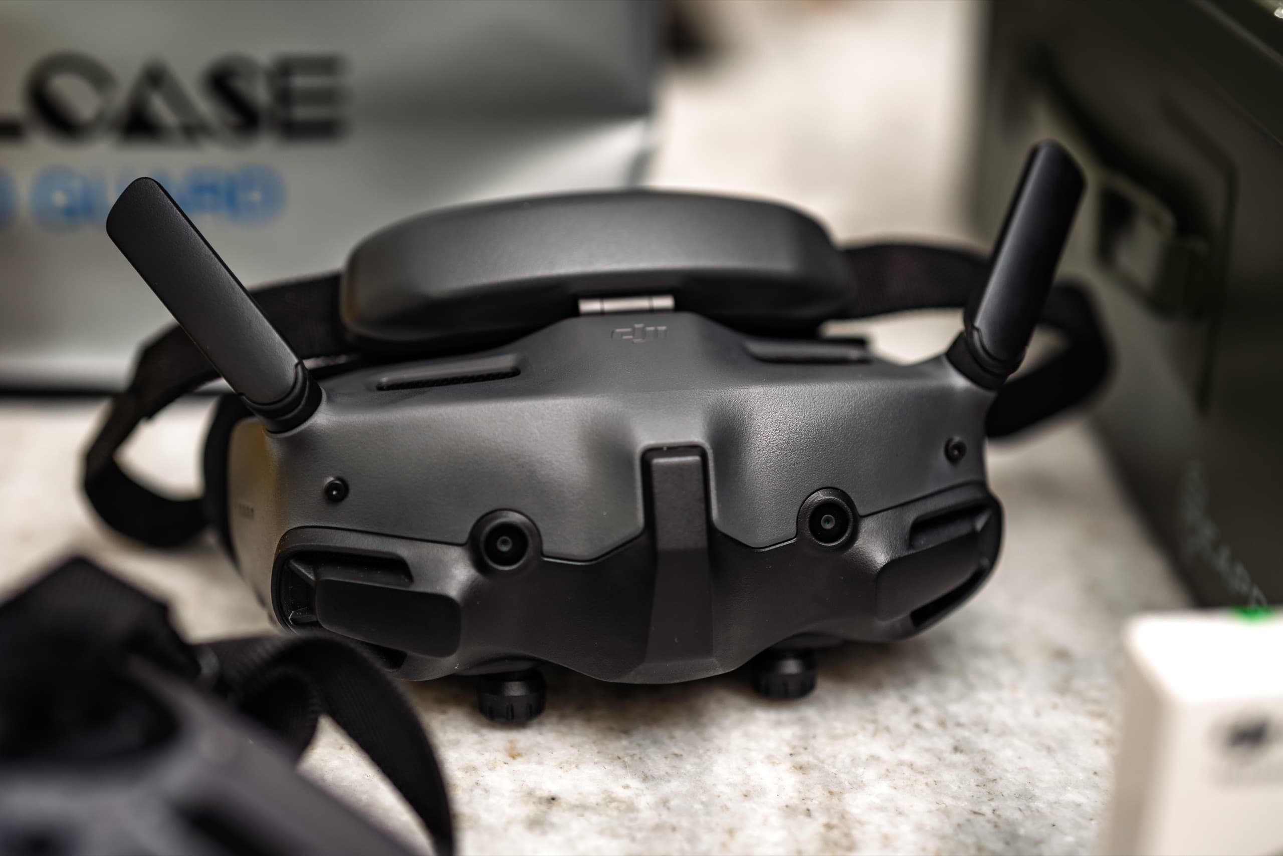 FPV goggles and controller on a workbench